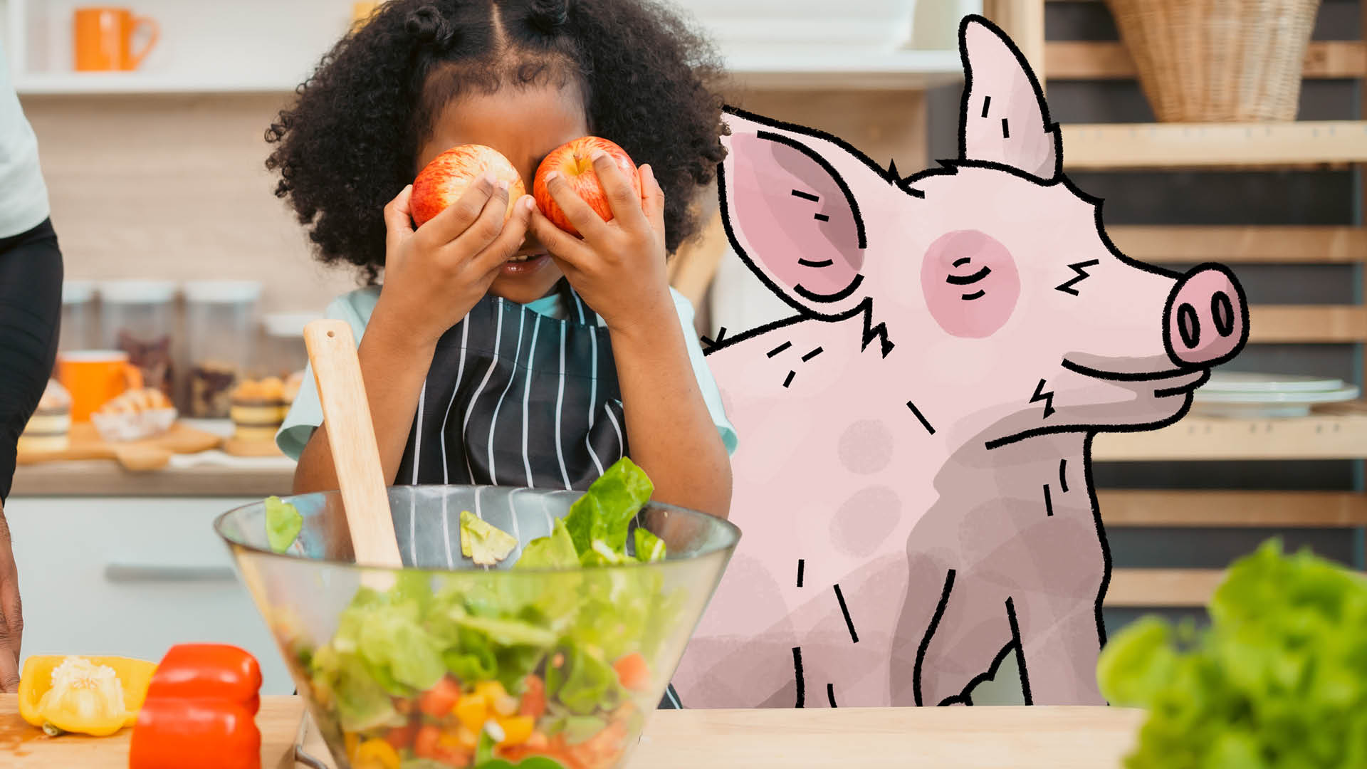 Ein Kind hält sich zwei rote Äpfel vor die Augen und ein illustrierts Ferkel sitzt sitzt neben ihr und beide sitzen zusammen in der Küche